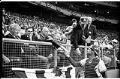 Image of Bob Stinson and Danny Kaye shaking hands at first Mariners game, April 6, 1977