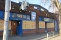 Image of Blue Moon Tavern boarded up during coronavirus pandemic, Seattle, April 9, 2020