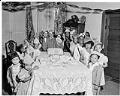 Image of Children around table at birthday party, Seattle, circa 1950