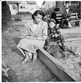 Image of Izzy and Butch Smith at a sandbox, Seattle, circa 1948