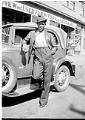 Image of Man leaning against car, Seattle, circa 1935