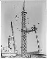Image of Seafair clown releasing balloons near Space Needle construction site, July 30, 1961