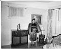 Image of Sadie Stovall in her living room, circa 1947