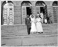 Image of Bride and groom on steps of Immaculate Conception Church, Seattle, circa 1947