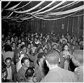Image of Black servicemen and their dates at a dance, Seattle, circa 1944