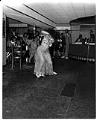 Image of Woman in costume dancing at club,  Seattle, circa 1948