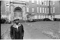 Image of Charlie James in front of Colman School building, Seattle, December  5, 1985