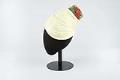 Image of Light green hat with flower in plastic cage from John Eaton, 1960s