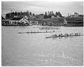 Image of Husky crew and Indigenous canoe race, La Conner, November 29, 1941