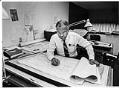 Image of Benjamin McAdoo working in his architectural offices, Seattle, 1981