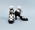 Image of Black satin pumps with satin laces, ca. 1930-1940