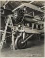 Image of Inspectors examining a Boeing Model 80-A plane at the Boeing factory, Seattle, October 19, 1929