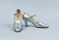 Image of Silver heeled shoes with gold accents, ca. 1920-1925