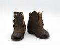 Image of Child's brown shoes with black toe caps, ca. 1858