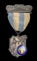 Image of Juror badge for the Alaska-Yukon-Pacific Exposition (AYPE), 1909