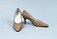 Image of Beige reptile designer pumps, ca. 1963