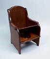 Image of Child's potty chair and duty seat made by Julius Christenson, ca. 1893