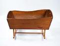 Image of Wooden baby cradle made by Julius Christison, 1893