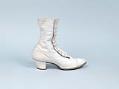 Image of White leather high button shoes, ca. 1917