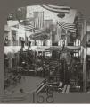 Image of Steam donkeys and other equipment on exhibit in Machinery Building at Alaska-Yukon-Pacific Exposition, Seattle, 1909