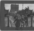 Image of Crowd going to see battleships, Seattle, 1908