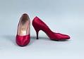 Image of Pair of hot pink fabric pumps from Best's Apparel, 