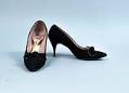 Image of Black high heels with black bows, ca. 1950s