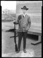 Image of Trapshooter L.S. Barnes with gun, Seattle, circa 1920