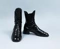 Image of Black patent boots worn by John Doyle Bishop, ca. 1960s-1970s
