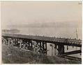 Image of Northern Pacific trestle along shore of Lake Union, showing frontage owned by Pacific Coast Coal Co., Seattle, circa 1915