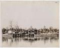 Image of Coal yard at Madison Park showing lake frontage and barges, Seattle, circa 1915