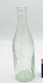 Image of Pale green glass beer bottle, Geo. T. McGinnis & Co., Seattle, WA, ca. 1900-1920