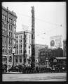 Image of Totem pole at Pioneer Square, 1915