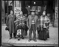 Image of Two Yakama couples outside a Seattle hotel, January 29, 1921