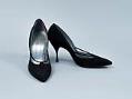 Image of Pair of back stiletto heels, ca. 1963