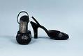 Image of Black sling-back pumps with silver fireworks decoration, ca. 1940s-1950s