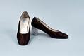 Image of Pair of brown pumps with rhinestone heels, ca. 1968