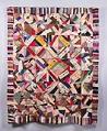 Image of Crazy quilt featuring commemorative ribbons from the Alaska-Yukon-Pacific Exposition (AYPE), 1911