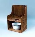 Image of Potty chair made from a Carnation milk crate, ca. 1910-1920