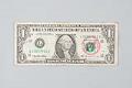 Image of Dollar bill from the World Trade Organization (WTO) protest, 1999