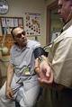Image of Pierre Parent having his blood pressure checked at the Monroe Correctional Complex, August 14, 2002