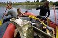 Image of Volunteers cleaning trash from the Snoqualmie River, August 25, 2002