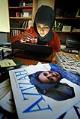 Image of Marlina Soerakoesoemah editing fashion pictures for Azizah magazine, Redmond, September 2002