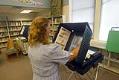 Image of Election voter using touch screen at Martha Lake school, Lynnwood, September 18, 2002