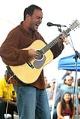Image of Dave Matthews performing at Northwest Old-Growth Campaign rally, Seattle, September 29, 2002