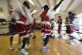 Image of Sudanese dancers rehearsing for performance at Highline YMCA, Burien, October 20, 2002