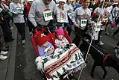 Image of Participants run and ride in the Jingle Bell Run fund raiser, Seattle, December 8, 2002