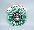 Image of Starbucks Coffee sign with green-and-black mermaid logo, 
