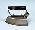 Image of Electric iron with trivet and detachable cord, used at Hong Lee Laundry, ca. 1930s