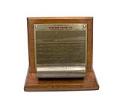 Image of Plaque listing the 1950 records set by Slo-Mo-Shun IV, displayed with a section of original K Monel Shaft, 1950